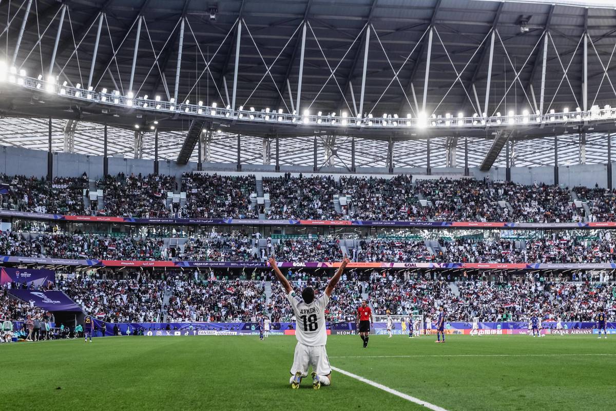 Aymen Hussein pictured celebrating after scoring two goals for Iraq in a 2-1 win over Japan at the AFC Asian Cup in January 2024